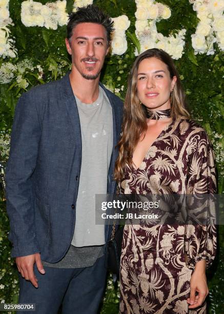 Eric Balfour and Erin Chiamulon attend the Maison St-Germain LA Debut hosted by Lily Kwong on August 02, 2017 in Los Angeles, California.
