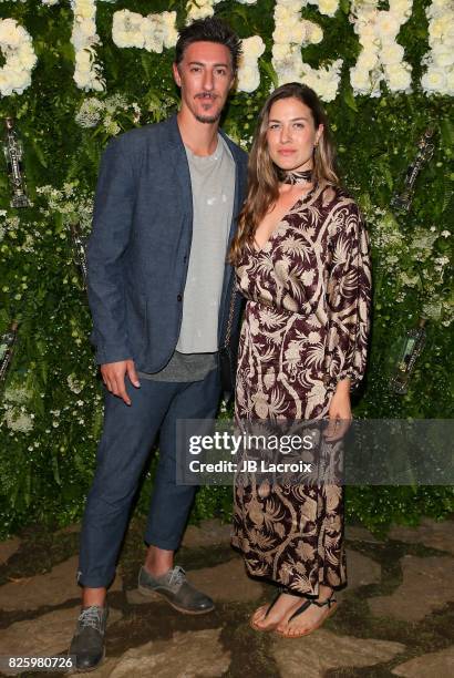 Eric Balfour and Erin Chiamulon attend the Maison St-Germain LA Debut hosted by Lily Kwong on August 02, 2017 in Los Angeles, California.