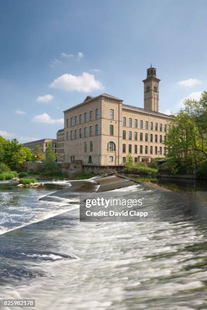 salt's mill in yorkshire - river aire stock pictures, royalty-free photos & images