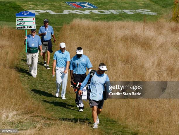 Sergio Garcia and Vijay Singh walk to the 16th green during the first round of the Deutsche Bank Championship held at TPC Boston on August 29, 2008...