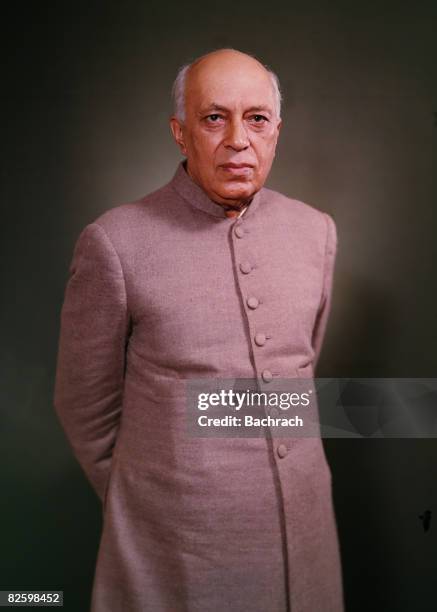 Studio portrait of Indian politician and India's first Prime Minister Jawaharlal Nehru as he stands with his hands behind his back, early 1960s.