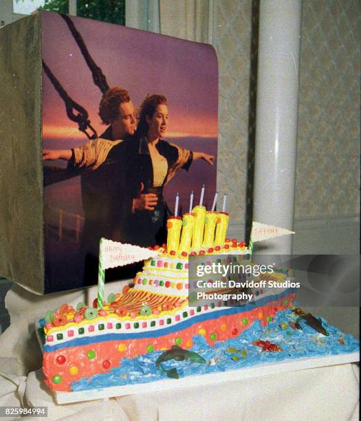 View of Tiffany Trump's 'Titanic'-themed cake during her fifth birthday party at the Mar-a-Lago estate, Palm Beach, Florida, October 13, 1998. Behind...