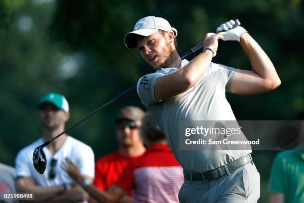 Danny Willett of England hits off the 11th tee during thei first round of the World Golf Championships - Bridgestone Invitational at Firestone...