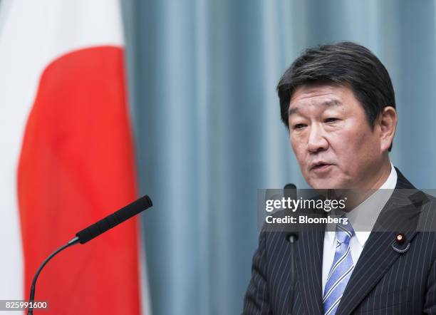 Toshimitsu Motegi, newly-appointed economic revitalization minster of Japan, speaks during a news conference at the Prime Minister's official...