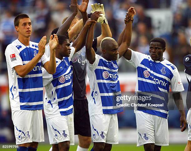 Sandro Wagner, Cedrick Makiado, Serge Branco and Valentien Atem of Duisburg celebrate the 2-0 victory after during the 2nd Bundesliga match between...