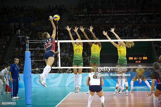 Summer Olympics: USA Logan Tom in action vs Brazil Sheilla Castro , Fabiana Claudino and Marianne Steinbrecher during Women's Gold Medal Match at...