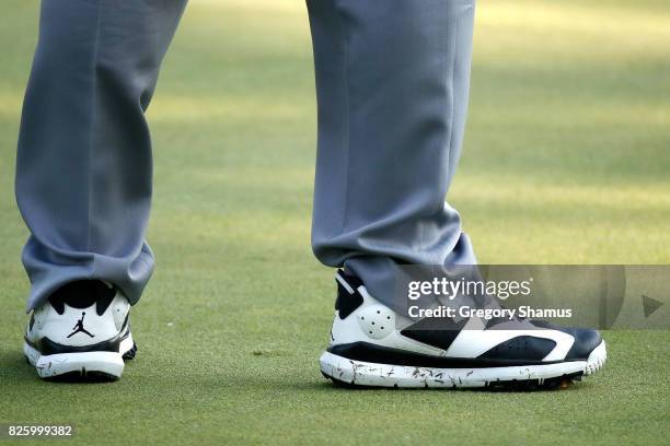 Detail view of the Nike Air Jordan 6 golf shoes worn by Pat Perez as he prepares to hit off the sixth tee during thei first round of the World Golf...