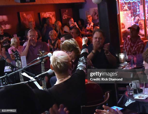 Singer/Songwriter Lorrie Morgan sings Happy Birthday to Manager Tony Conway during "An Intimate Night With The Morgans" Lorrie Morgan, Marty Morgan...