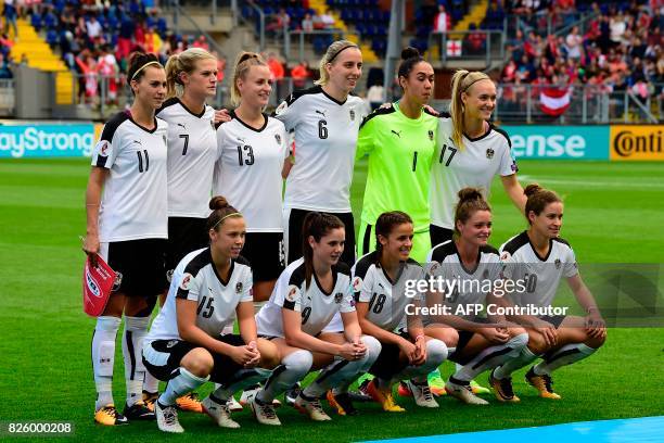 Austria's defender Viktoria Schnaderbeck, defender Carina Wenninger, defender Virginia Kirchberger midfielder Katharina Schiechtl, goalkeeper Manuela...