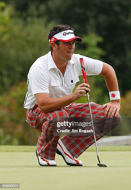 Eric Axley lines up a putt during the first round of the Deutsche Bank Championship at the TPC Boston on August 29, 2008 in Norton, Massachusetts.