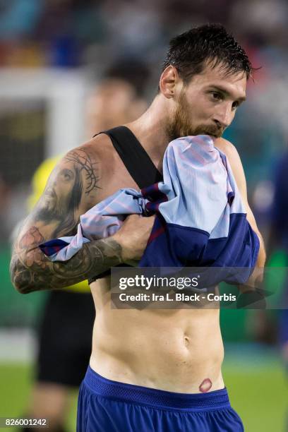 Lionel Messi of Barcelona looks tired after the International Champions Cup El Clásico match between FC Barcelona and Real Madrid at the Hard Rock...