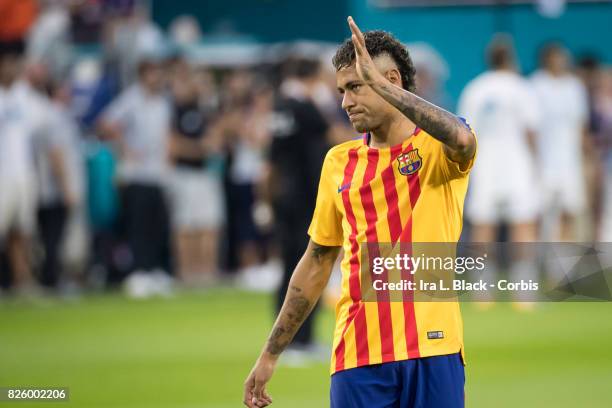 Neymar of Barcelona waves to the crowd during the International Champions Cup El Clásico match between FC Barcelona and Real Madrid at the Hard Rock...