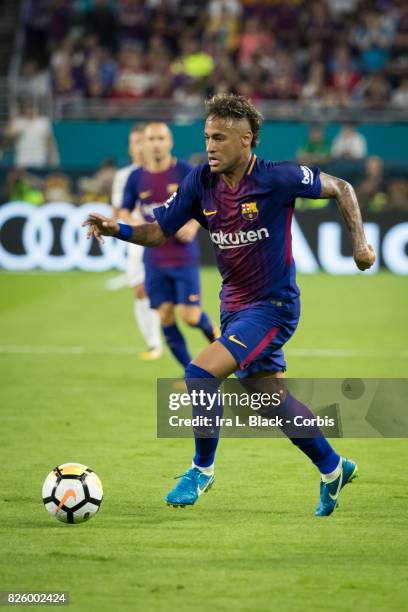 Neymar of Barcelona drives to the goal during the International Champions Cup El Clásico match between FC Barcelona and Real Madrid at the Hard Rock...