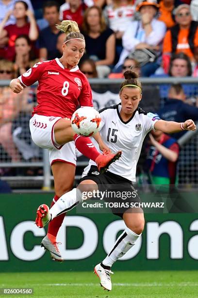 Denmark's defender Theresa Nielsen (L0 vies for the ball with Austria's forward Nicole Billa during the UEFA Womens Euro 2017 football tournament...