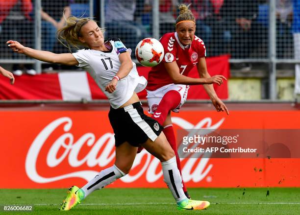 Denmark's midfielder Sanne Troelsgaard kicks the ball past Austria's midfielder Sarah Puntigam during the UEFA Womens Euro 2017 football tournament...
