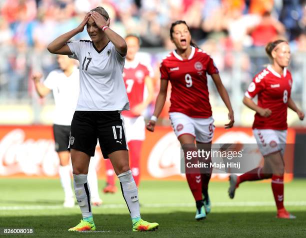 Sarah Puntigam of Austria reacts after missing a penalty during the UEFA Women's Euro 2017 Semi Final match between Denmark and Austria at Rat...