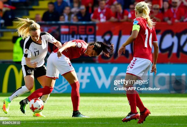 Denmark's forward Nadia Nadim vies for the ball with Austria's midfielder Sarah Puntigam during the UEFA Womens Euro 2017 football tournament...