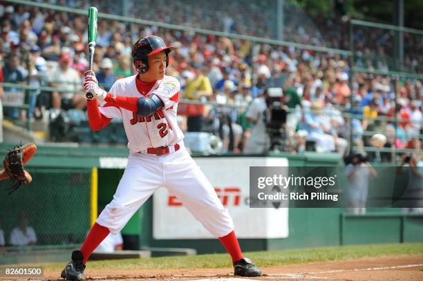 Ryosuke Moriuchi of the Edogawa Minami Little League team from Tokyo, Japan bats against the Matamoros Little League team from Matamoros, Mexico...