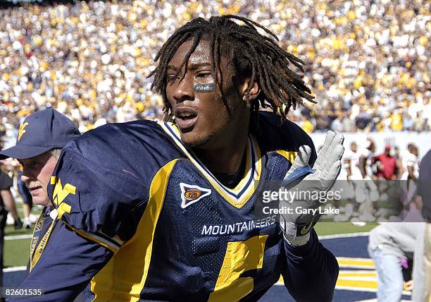 West Virginia University wide receiver Chris Henry celebrates after scoring the game winning TD. WVU defeated the Maryland Terrapins 19-16 in...