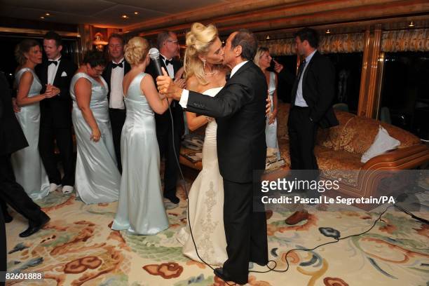 Anna Anka and Paul Anka kiss during their wedding on the yacht M.Y Siran on July 26, 2008 in Porto Cervo, Sardinia, Italy.
