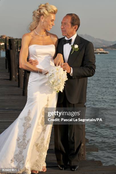 Singer Paul Anka and Anna Anka pose during their wedding at Hotel Cala di Volpe on July 26, 2008 in Porto Cervo, Sardinia, Italy.