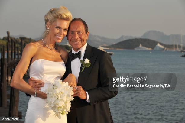 Singer Paul Anka and Anna Anka pose during their wedding at Hotel Cala di Volpe on July 26, 2008 in Porto Cervo, Sardinia, Italy.