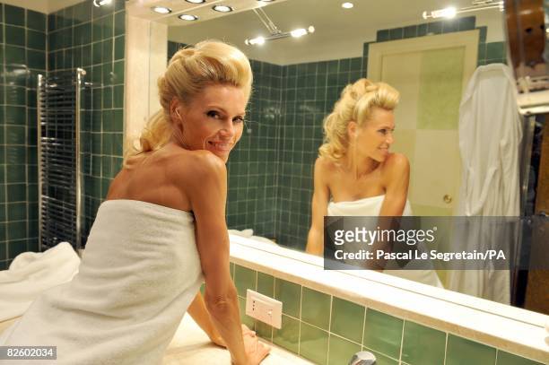 Anna Anka poses in her bathroom at the Hotel Cala di Volpe as she getting ready for her wedding with Paul Anka on July 26, 2008 in Porto Cervo,...