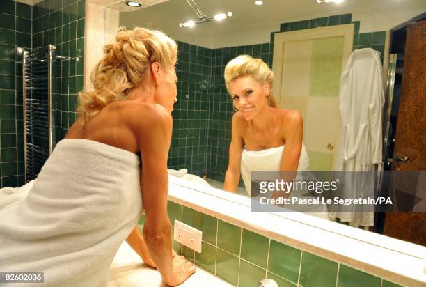 Anna Anka poses in her bathroom at the Hotel Cala di Volpe as she getting ready for her wedding with Paul Anka on July 26, 2008 in Porto Cervo,...