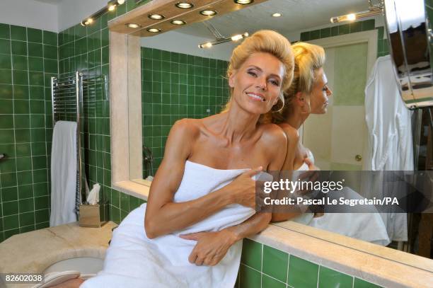 Anna Anka poses in her bathroom at the Hotel Cala di Volpe as she getting ready for her wedding with Paul Anka on July 26, 2008 in Porto Cervo,...