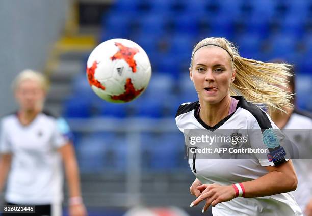 Austria's midfielder Sarah Puntigam eyes the ball during the UEFA Womens Euro 2017 football tournament semi-final match between Denmark and Austria...