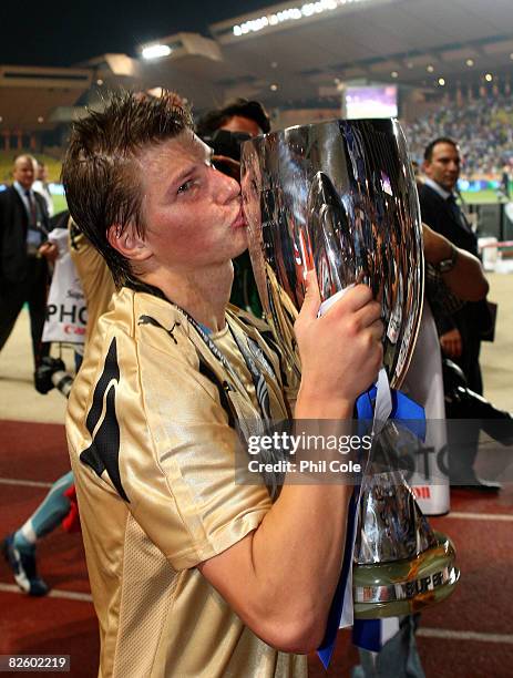 Andrei Arshavin of Zenit St.Petersburg kisses the trophy after wiining the UEFA Super Cup between Manchester United and Zenit St.Petersburg at the...