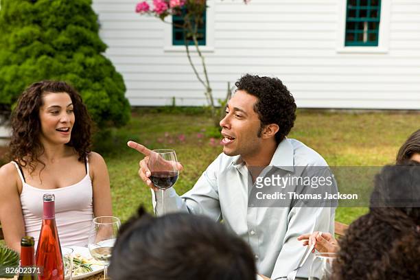 hispanics at outdoor garden party at country home - napanoch stock pictures, royalty-free photos & images
