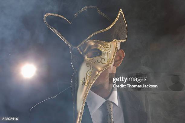 man in carneval mask, night, outdoors - napanoch stock pictures, royalty-free photos & images