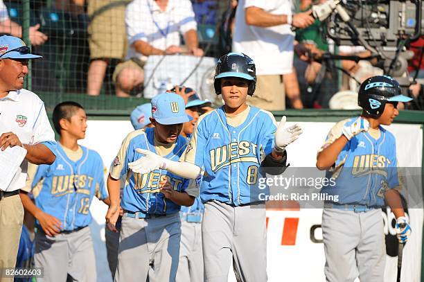 Iolana Akau of the Waipio Little League team celebrates during the World Series Championship game against the Matamoros Little League team at Lamade...