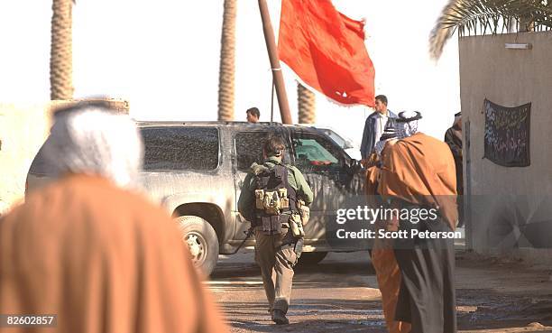 Jan. 25-- American Blackwater security guards protect American diplomats as they meet with Iraqi Shiites of the large Bani Hassan tribe and its new...