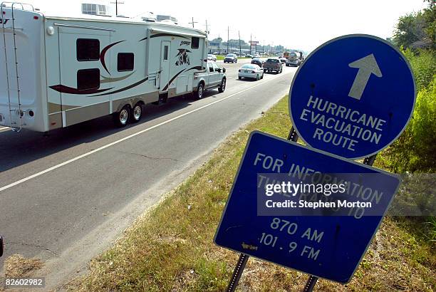 Long line of cars evacuate from Tropical Storm Gustav August 2008 in Luling, Louisiana. The New Orleans area is bracing for a storm that forecasters...