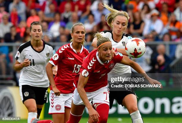 Denmark's midfielder Sanne Troelsgaard vies for the ball with Austria's midfielder Sarah Puntigam during the UEFA Womens Euro 2017 football...