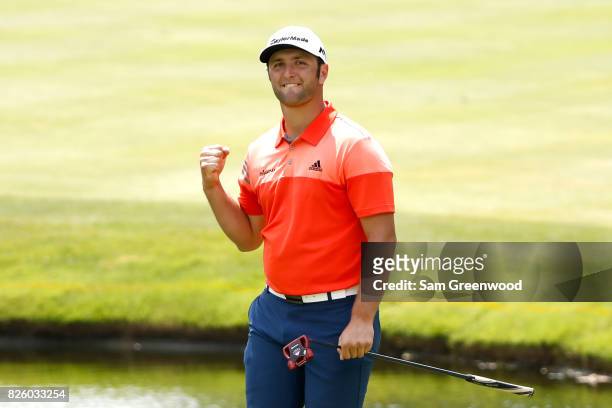 Jon Rahm of Spain reacts after an eagle on the 16th hole during the first round of the World Golf Championships - Bridgestone Invitational at...
