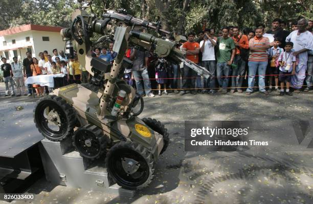 Techfest 2009 - Tech Festival - Daksh the remote controlled robot can be used to handle, scan and diffuse bombs and explosives. Approved by the...