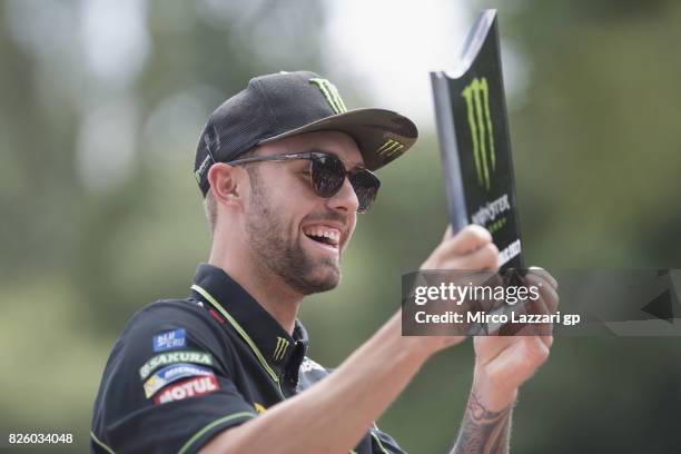Jonas Folger of Germany and Monster Yamaha Tech 3 smiles during the pre-event "Motogp riders make a JetSurf competition at the Brno Dam" during the...