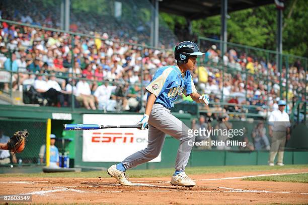 Jedd Andrade of the Waipio Little League team hits during the World Series Championship game against the Matamoros Little League team at Lamade...