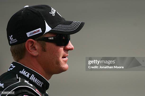 Clint Bowyer stands on the grid during qualifying for the NASCAR Sprint Cup Series Pepsi 500 at Auto Club Speedway on August 29, 2008 in Fontana,...