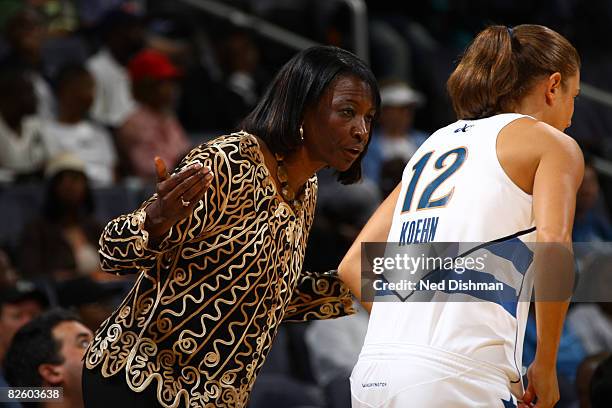 Laurie Koehn of the Washington Mystics speaks with Head Coach Jessie Kenlaw during game against the Chicago Sky at the Verizon Center on August 29,...