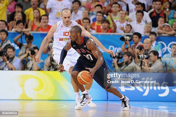 Kobe Bryant of the United States drives the ball against Carlos Jimenez of Spain during the gold medal game of the 2008 Beijing Summer Olympics at...