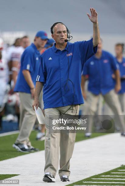 Head Coach June Jones of the Southern Methodist University Mustangs calls out a play from the sidelines against the Rice University Owls at Rice...