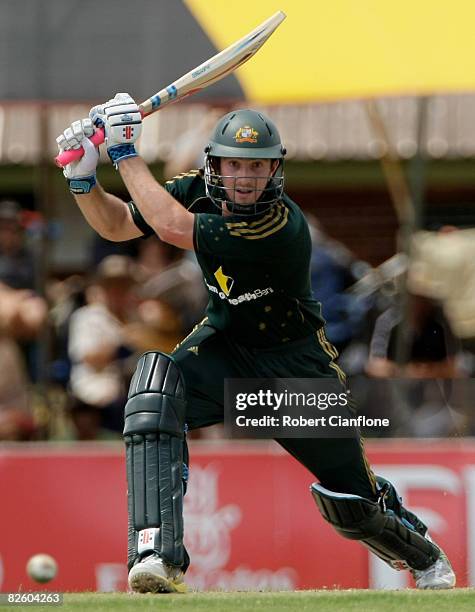 Shaun Marsh of Australia hits one away during the first one day international match between Australia and Bangladesh held at TIO Stadium August 30,...