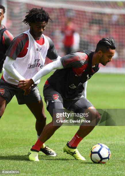 Theo Walcott and Ainsley Maitland-Niles of Arsenal during the Arsenal Training Session at Emirates Stadium on August 3, 2017 in London, England.