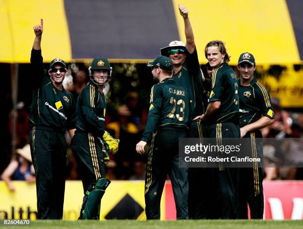 Australian players celebrate the dismissal of Alok Kopali of Bangladesh during the first one day international match between Australia and Bangladesh...