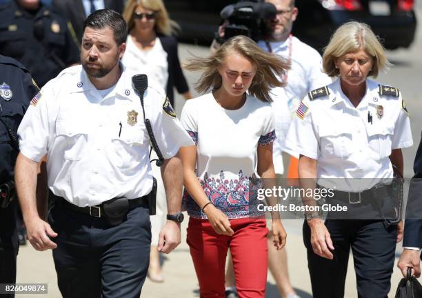 Michelle Carter is escorted into the Taunton District Court in Taunton, MA for her sentencing hearing on Aug. 3, 2017. Carter was found guilty of...