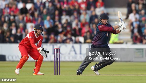 Richard Levi of Northamptonshire hits a boundary during the NatWest T20 Blast match between Northampton Steelbacks and Lancashire Lightening at The...